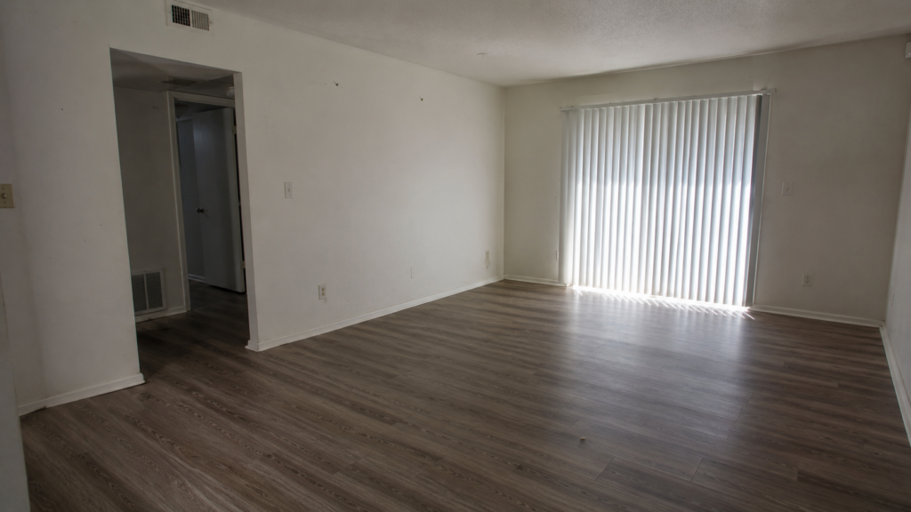 empty apartment living room after an eviction cleanout in Memphis, ready for cleaning repairs and leasing prep