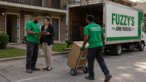 property operations partner Memphis, Fuzzy's crew carrying a loveseat out of a vacant apartment unit
